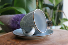 Load image into Gallery viewer, Handmade ceramic cup and saucer blue white pinstripe glaze
