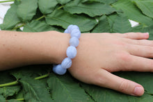 Load image into Gallery viewer, Side view of Blue Lace Agate nugget bracelet on wrist.