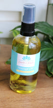 Load image into Gallery viewer, Mandarin and Vanilla scented body and bath oil with crystal infusion